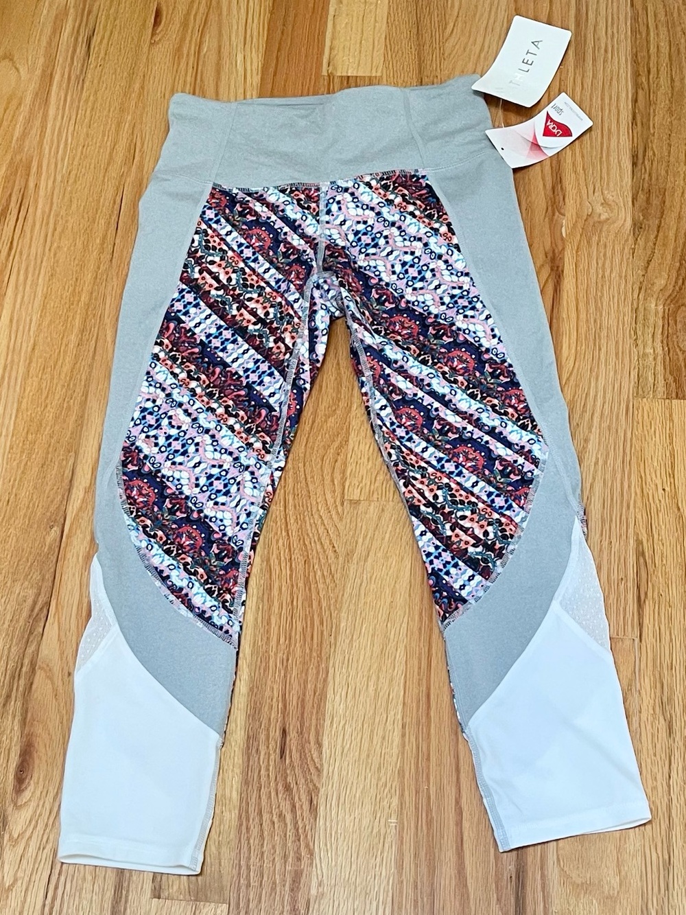 BNWT Athleta Nomad Salutation mesh Capri.